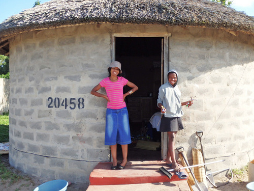 The lady on the left represents the Village Chief.